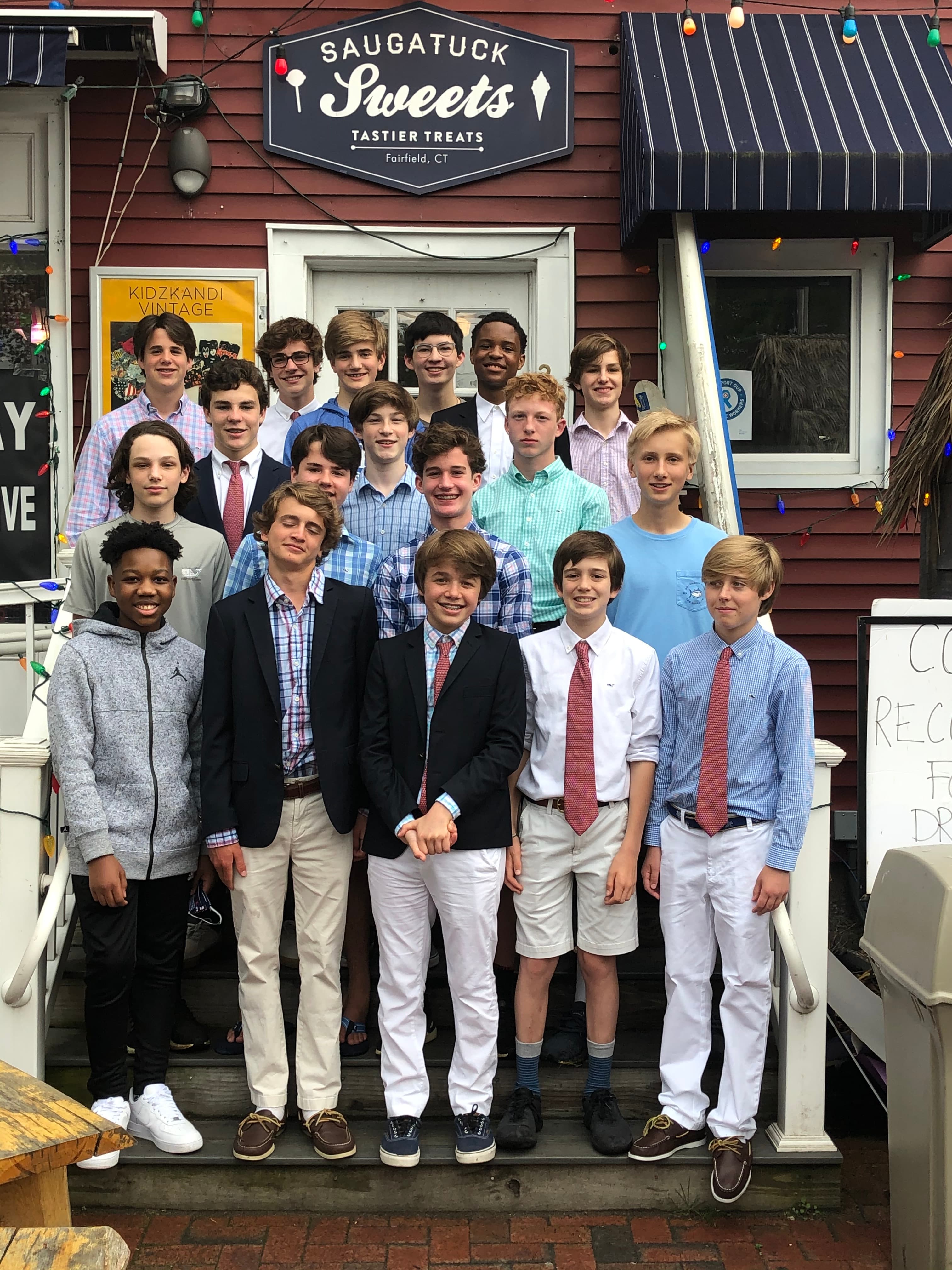 Sunday best on the steps of Reef Road.